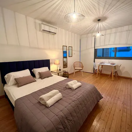 Апартаменты Rhea Down Town *